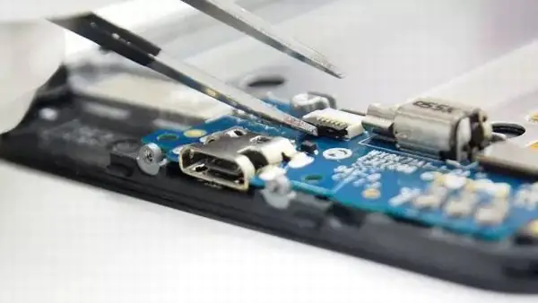 Disconnect the home button cable