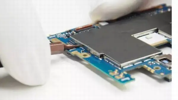 Remove all the metal shields from the motherboard
