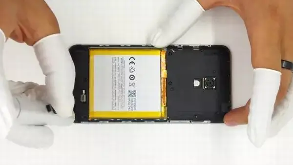 Use a pick to pry the speaker