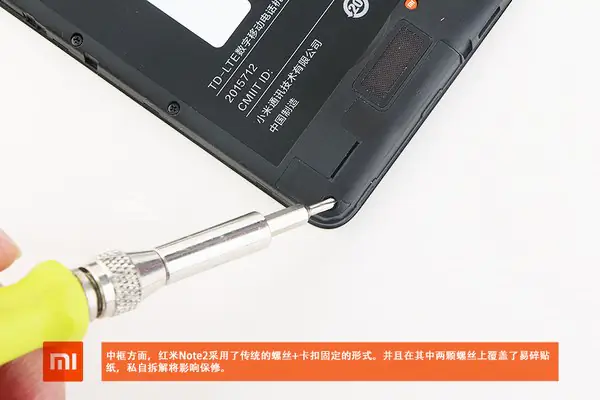Remove all screws securing the middle frame