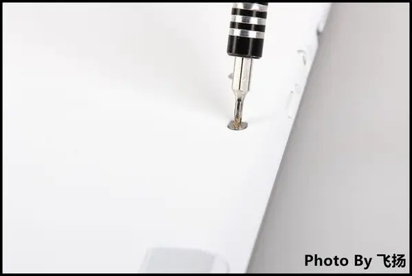 Remove all screws securing the bottom cover