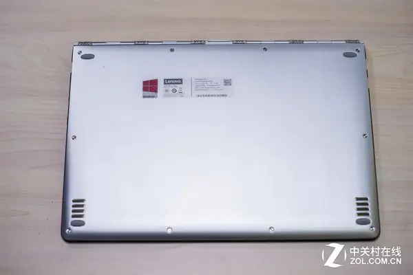 Remove the ten screws securing the bottom cover