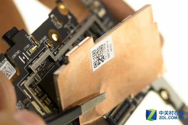 Remove the metal shield on the motherboard