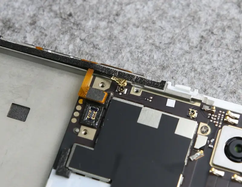 Disconnect the button cable and antenna