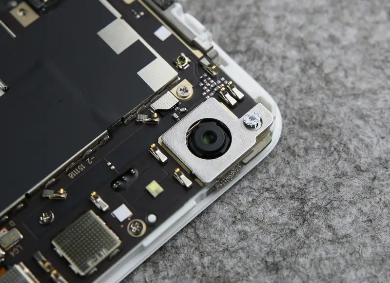 Remove the metal cover from the camera