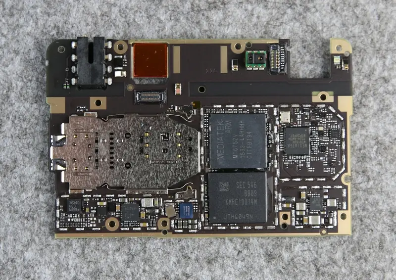 Close-up of the back of the motherboard after removing the metal shields