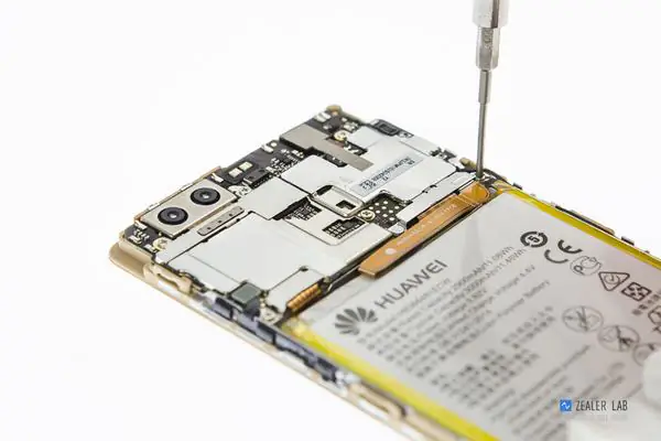 Remove all screws that secure the motherboard