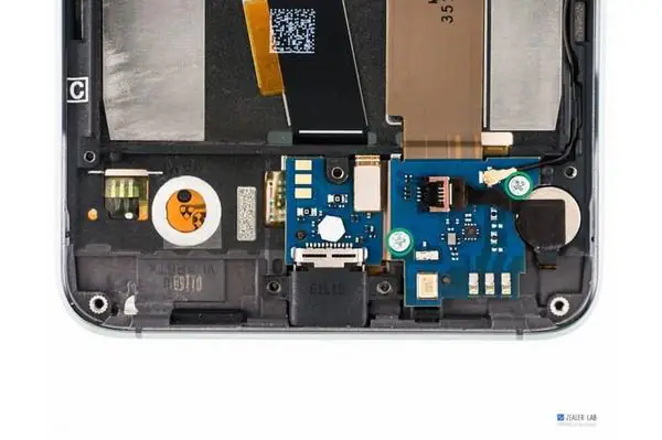 Remove the two screws securing the sub-board