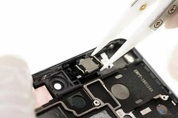 Remove the telephone receiver