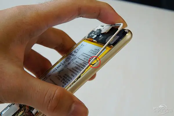 Remove all screws securing the middle frame