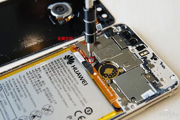 Remove the two screws that secure the metal bracket