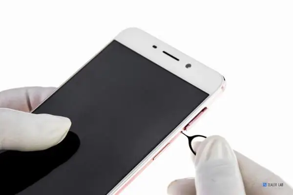 Remove the SIM card tray