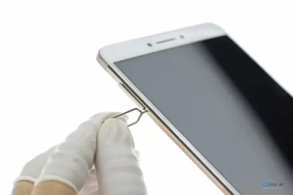 Remove the SIM card tray