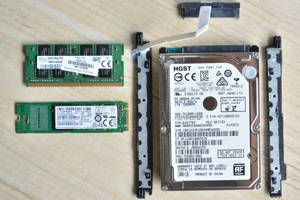 SK Hynix 8GB memory, Samsung 128GB M.2 SSD, and HGST 1TB hard drive