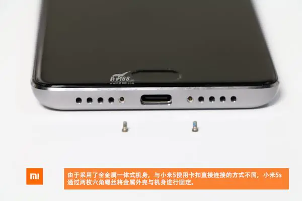 Remove the two screws beside the USB Type-C port
