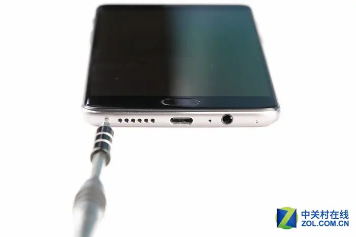 Remove the two screws located near the USB Type-C port