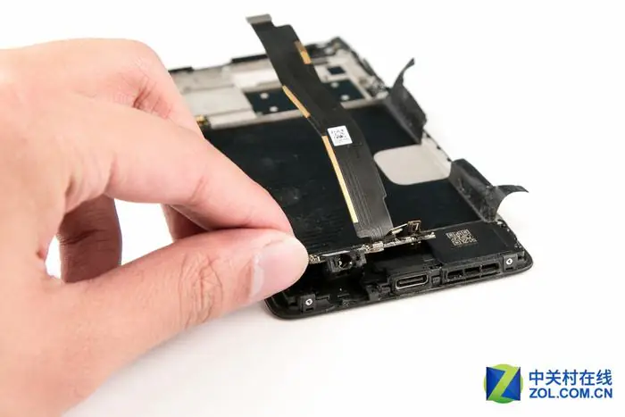 Lift and remove the sub-board