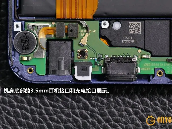 Lift the sub-board with tweezers