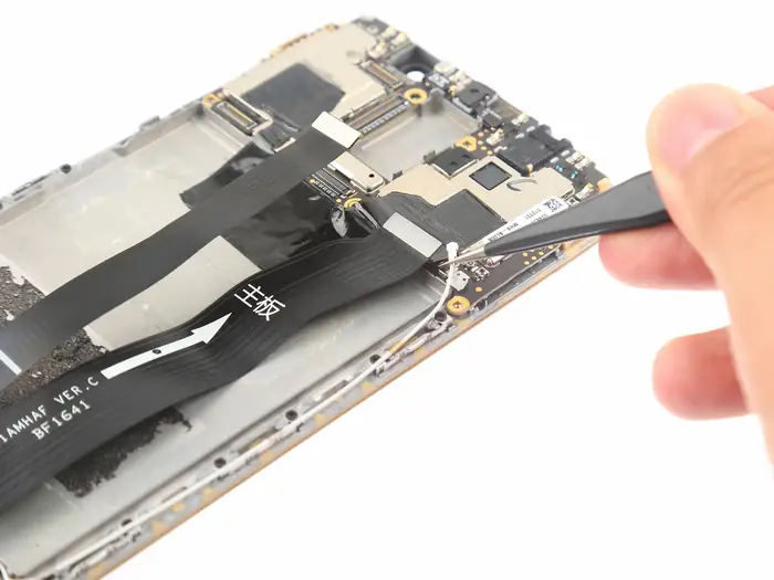 Disconnect the antenna cable from the motherboard