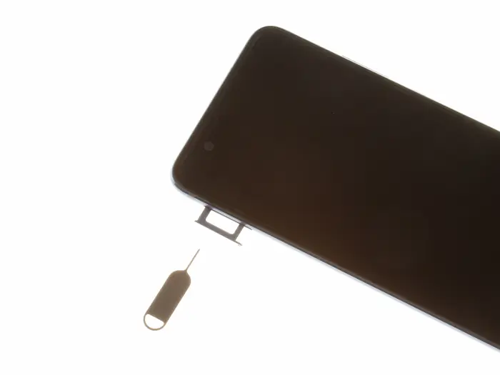Remove the SIM card tray