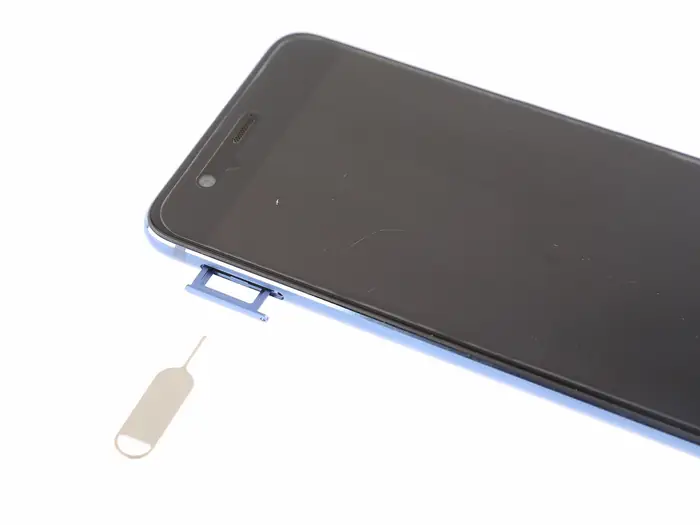 Remove the SIM card tray