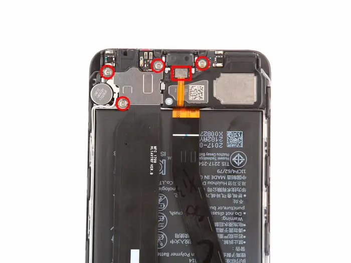 Remove the four screws securing the motherboard