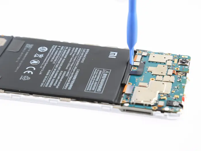 Disconnect the battery connector from the motherboard