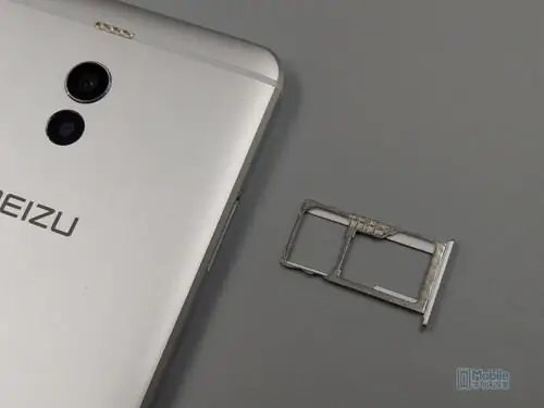 Remove the card slot tray