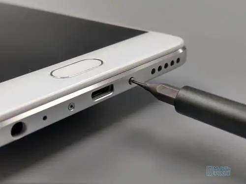 Remove the two screws