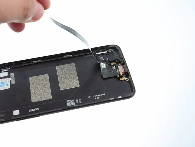 Remove the USB Type-C port/headphone jack module