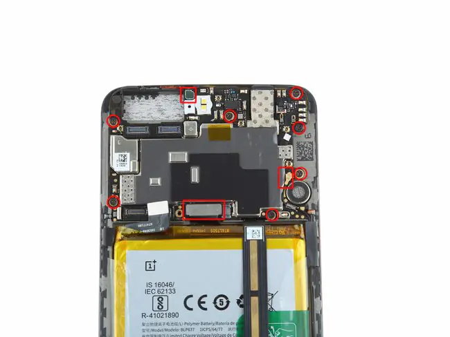 Remove the 7 screws securing the motherboard
