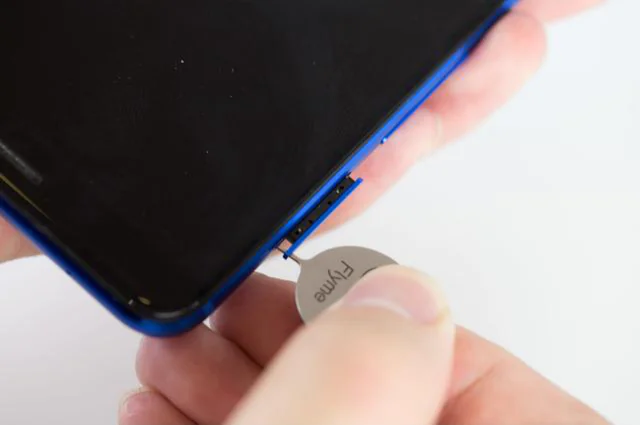 Remove the SIM card tray