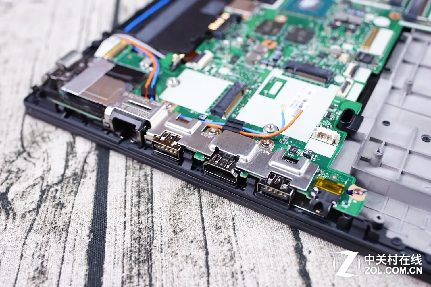 Remove the screws on the motherboard
