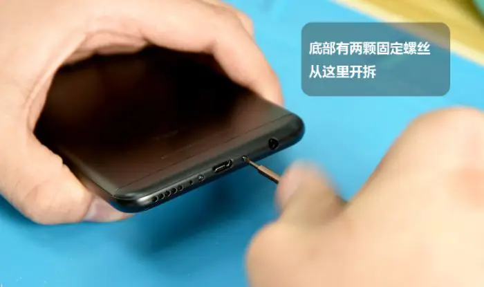Remove the two screws