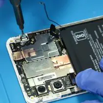 Remove the screws on the motherboard