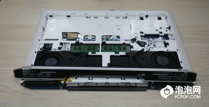 Remove all screws securing the middle frame