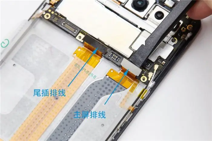 Disconnect the charging port ribbon cable
