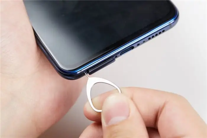 Remove the SIM card tray